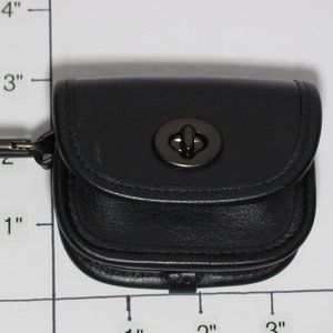 Coach Heritage calf leather turnlock pouch with carabiner clip